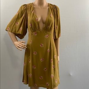 NWT. Free people mockinbird embroidered mesh